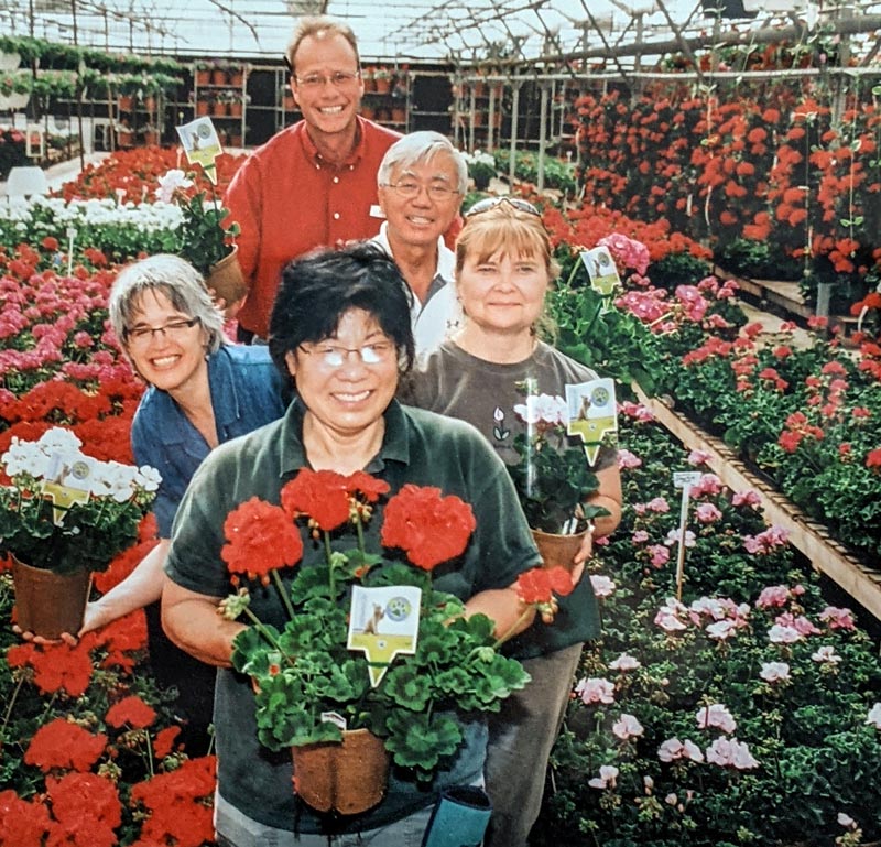 Tagawa team Jere Kris Beth Chuck Jim with geraniums